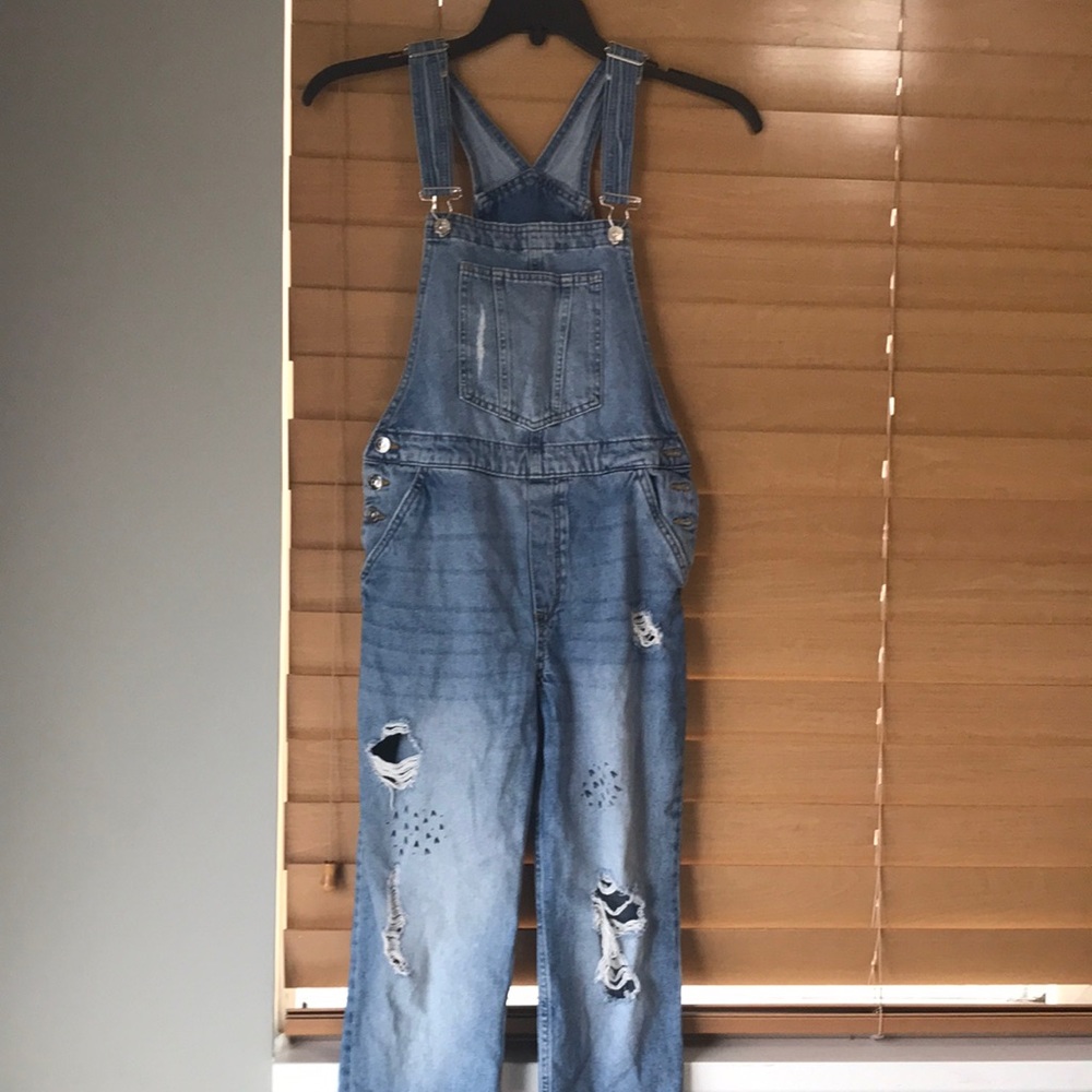 Light wash denim distressed overalls